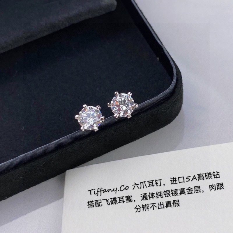 T*f*ny earrings